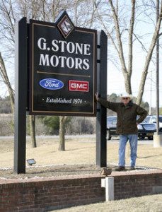 Gardner Stone of Family Trade by his G-Stone Motors sign (Source: GSN)