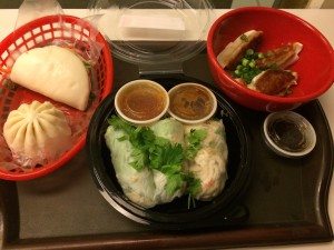 (L-R) Pork belly bao (top), sweet coconut custard bao (bootom) Chicken summer rolls w/ Spicy Peanut dipping sauce. Chicken potstickers w/ scallions. Photo courtesy of Ryan Leeds